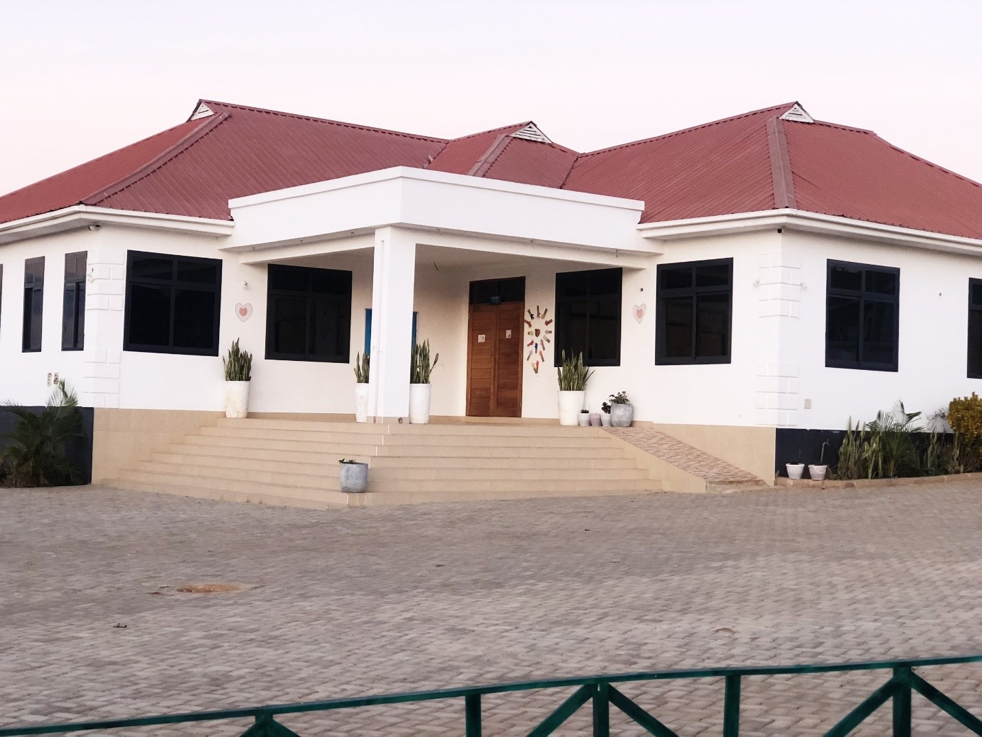 Hail Mary School main building at dusk